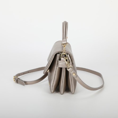 BORSA A TRACOLLA ORO CON CHIUSURA TONDA ORO