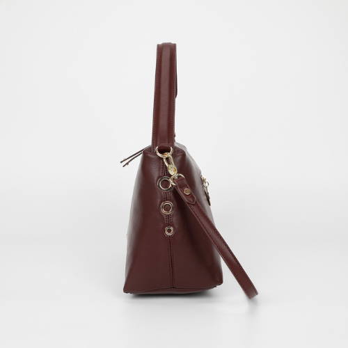 BORSA A SPALLA CON DETTAGLIO OCCHIELLI MOSTO
