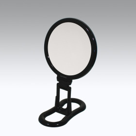 Specchio bifacciale con ingrandimento x 6, manico pieghevole e supporto da tavolo. Ø18cm.Colore nero